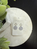 silver wallpaper with silver post earring