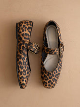 Load image into Gallery viewer, Leopard print shoes with buckles on a beige background
