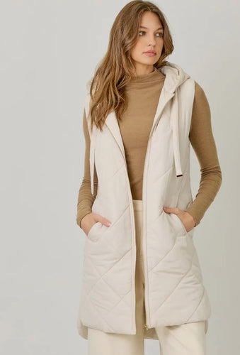 Vest puffer hood zipper pockets hi-lo hem shop fond du lac women’s boutique