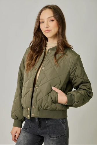Snap closure quilted bomber shop fond du lac women’s boutique 