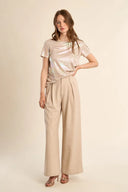 Back elastic waist high waist wide leg pleated pockets zip fly beige gold metallic thread shop fond du lac women’s clothing store 