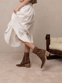 Stacked heel pointed toe zipper boot shop fond du lac women’s clothing store 