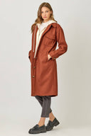 Pockets hood knee length long coat shop fond du lac women’s clothing store 