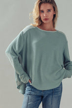 Load image into Gallery viewer, Crew neck oversized high low hem long sleeve top shop fond du lac women’s boutique 

