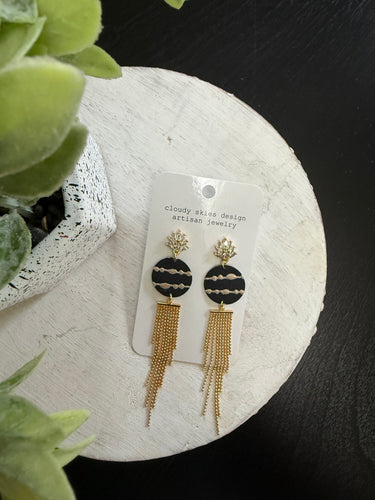 black and gold elegant wow earrings made from wallpaper by artist